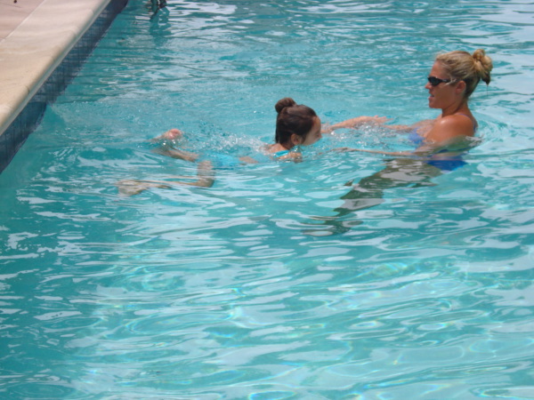 Alyss gives a swim lesson
